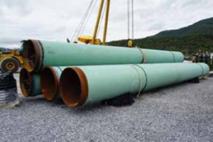 Figure 3. PipePillos used to stockpile 140 ft joints of 0.888 WT NPS42 pipe for the Mountain Valley Pipeline project in West Virginia, US.