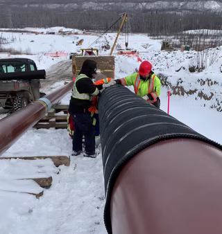 GridGuard on pipe with workers